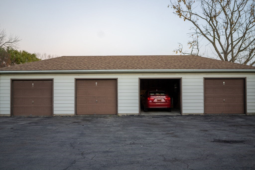 a garage with a car parked in it
