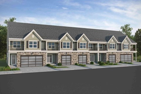 a rendering of a house with three garage doors