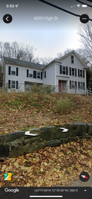 a picture of a white house in the fall