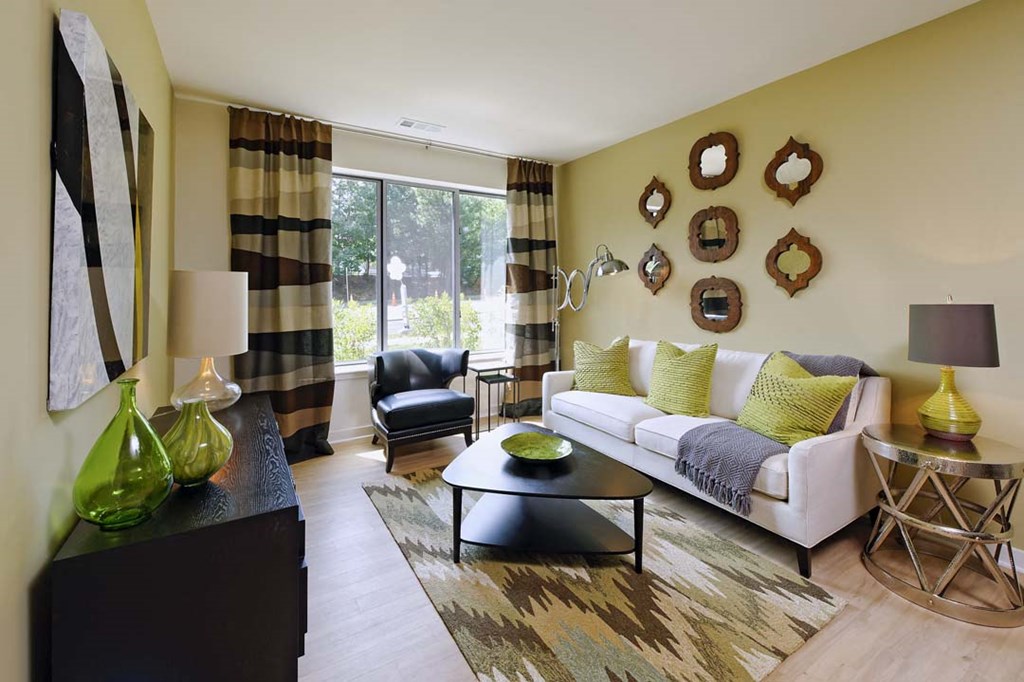 a living room with a couch and a table