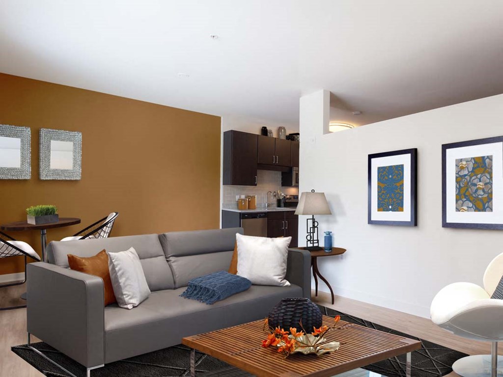 a living room with a couch and a table