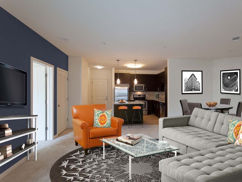 a living room with a couch and a table