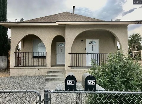 A house with the number 732 on the front door.