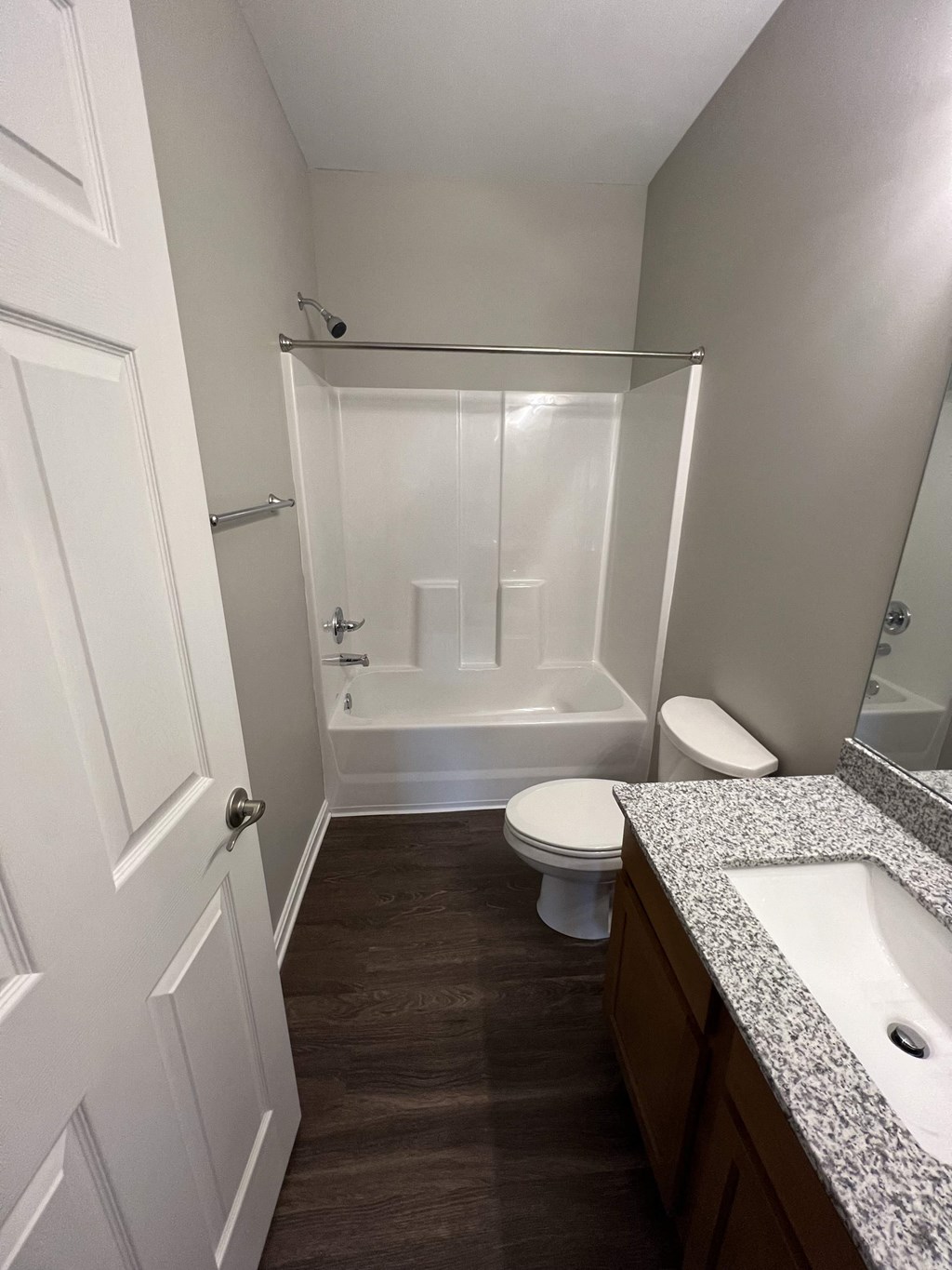 a small bathroom with a toilet and a shower