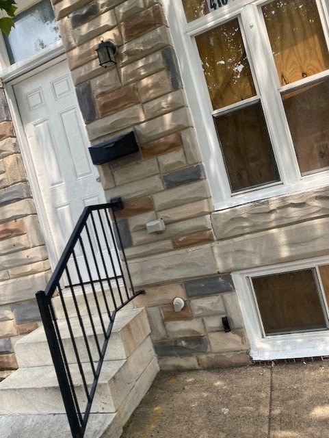a building with a staircase and a door on it