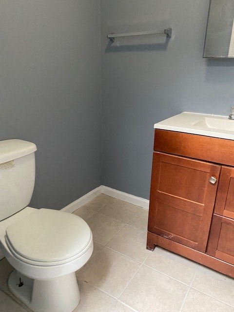 a bathroom with a toilet and a sink