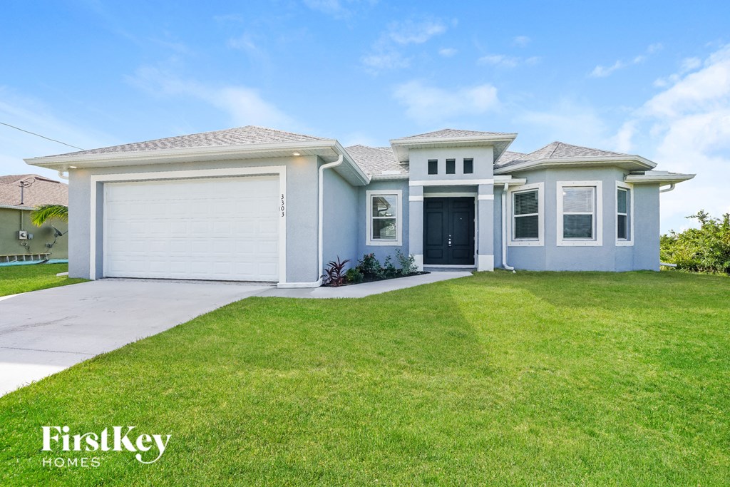 A two-story house with a garage is for sale by FirstKey Homes.