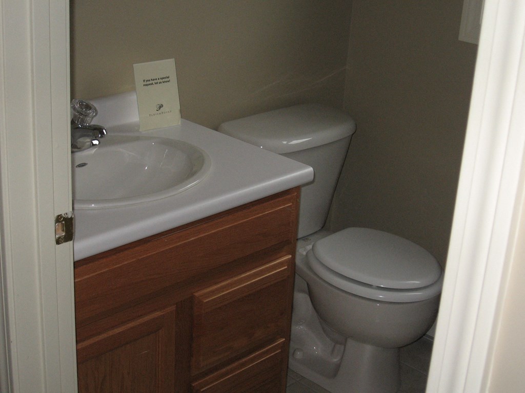 a small bathroom with a toilet and a sink