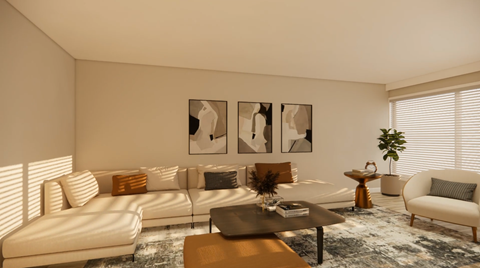 A living room with a white sofa, a coffee table, and a rug.