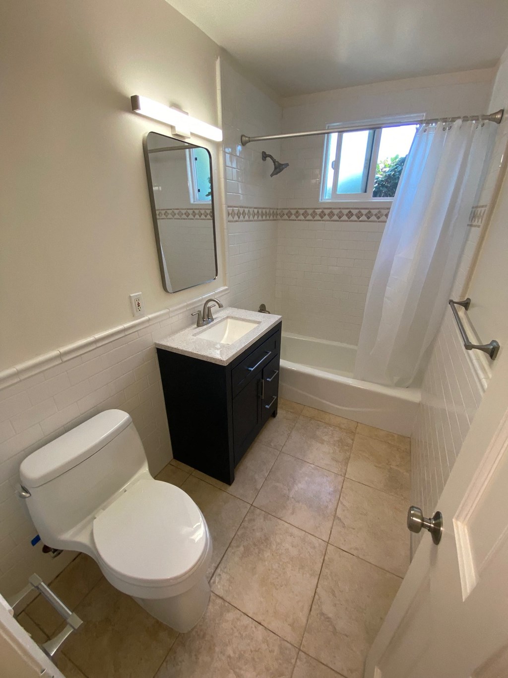 a small bathroom with a toilet and a sink