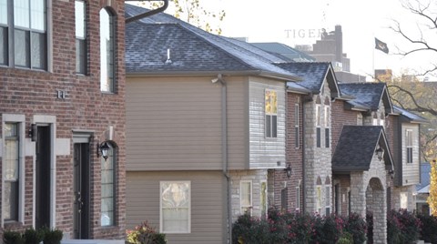 a row of houses on a city street