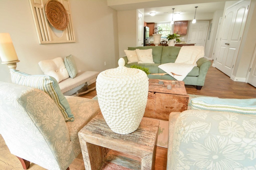 a living room with a couch and a table