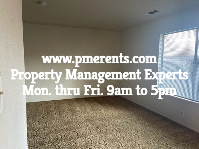 an empty room in an apartment with the words property management experts noon thru 8pm