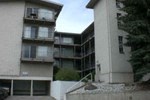 a view of an apartment building from the street