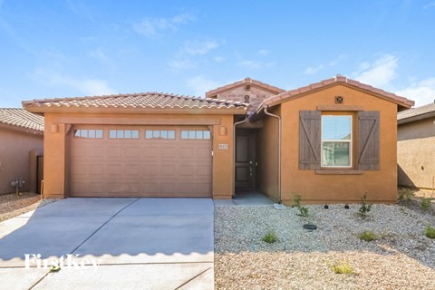 a house with a garage and a garage door
