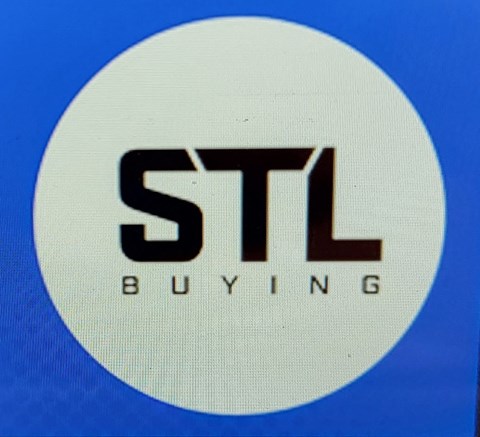 A sign with the letters STL and the word BUYING.