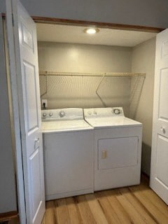 a white washer and dryer in a small room
