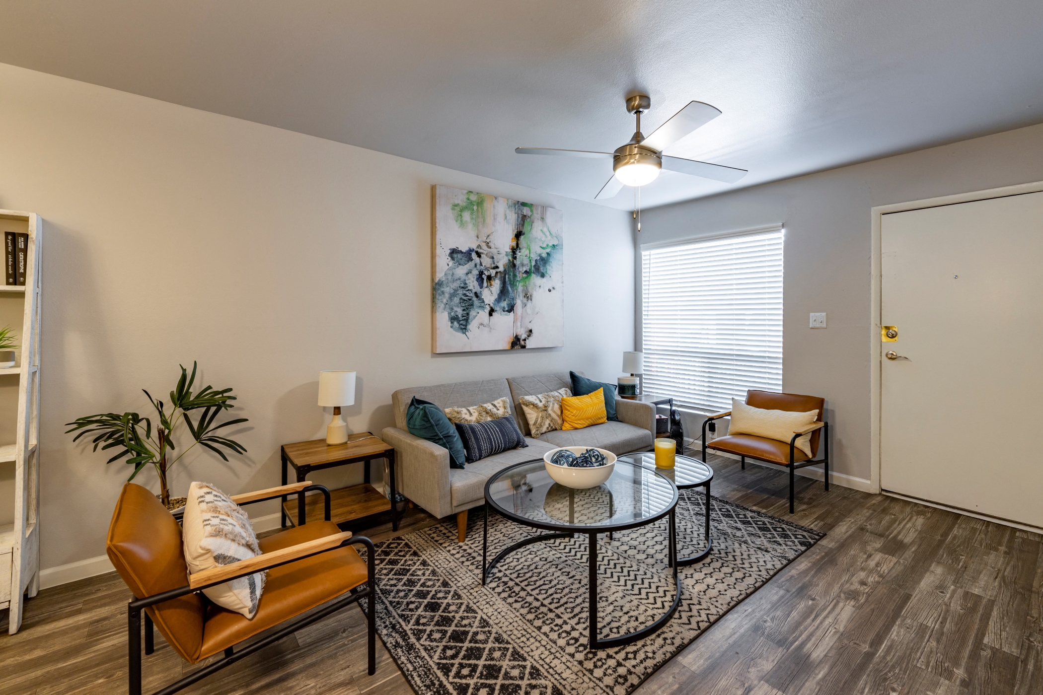 an open living room with a couch and a table