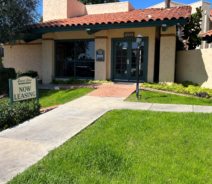 a building with a non leasing sign in front of it