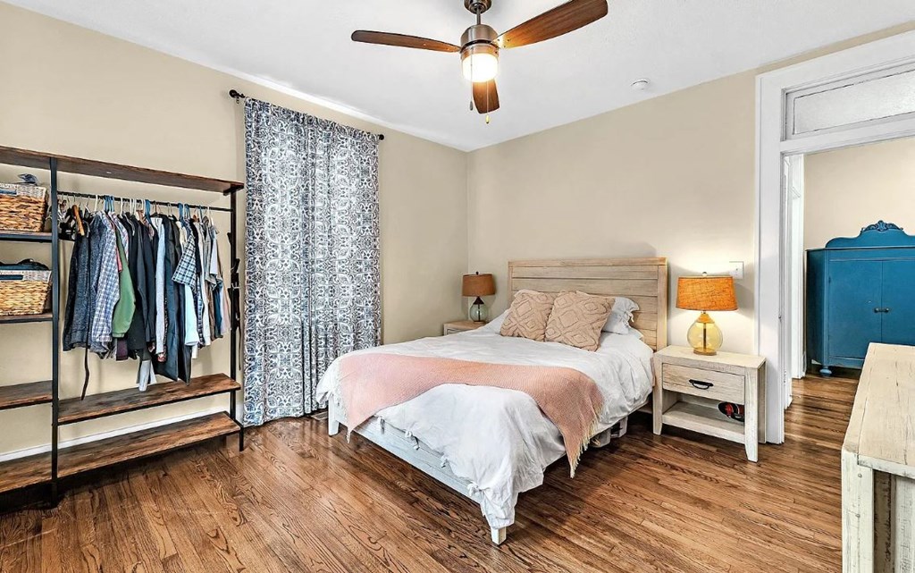 a bedroom with a bed and a closet