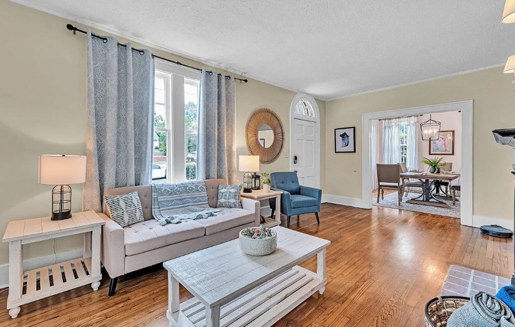 a living room with a couch and a table