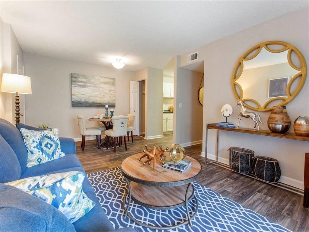 a living room with a couch and a table