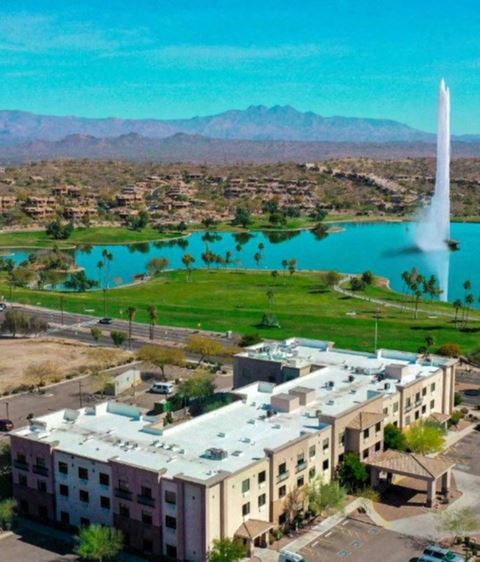 an aerial view of the fountain in front of the city of lake havasu