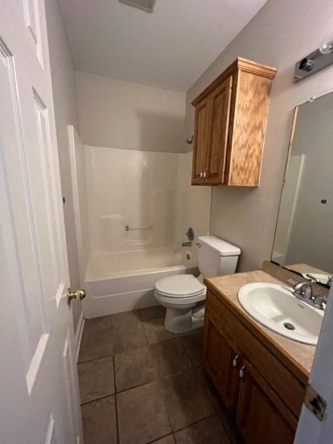 a bathroom with a toilet and a sink