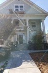 a reflection of a house in a window
