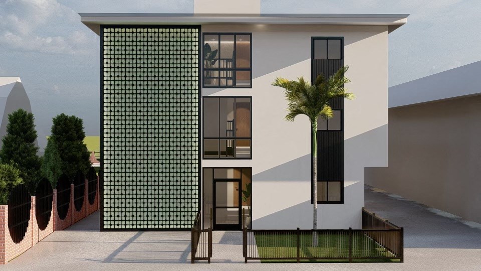 a building with a palm tree in front of it