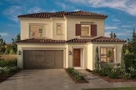 A house with a brown garage door and a brown door.
