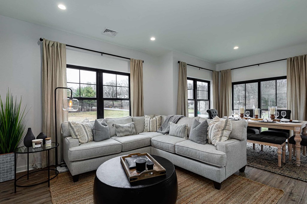 a living room with a couch and a table