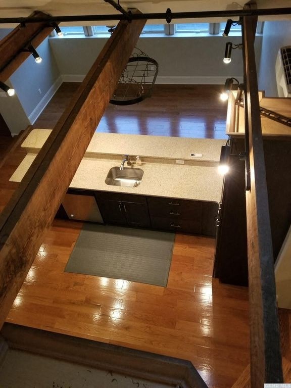 a bathroom with a sink and a window