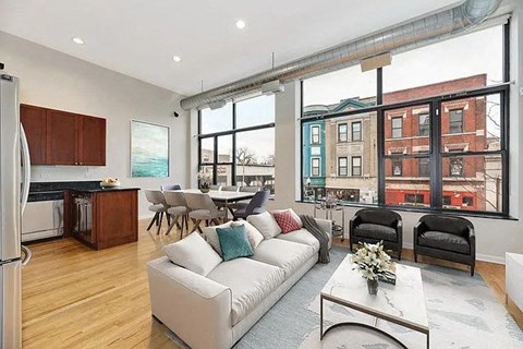 a living room with a couch and a table