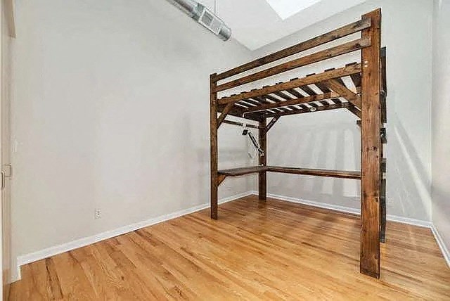 a bunk bed in the corner of a room