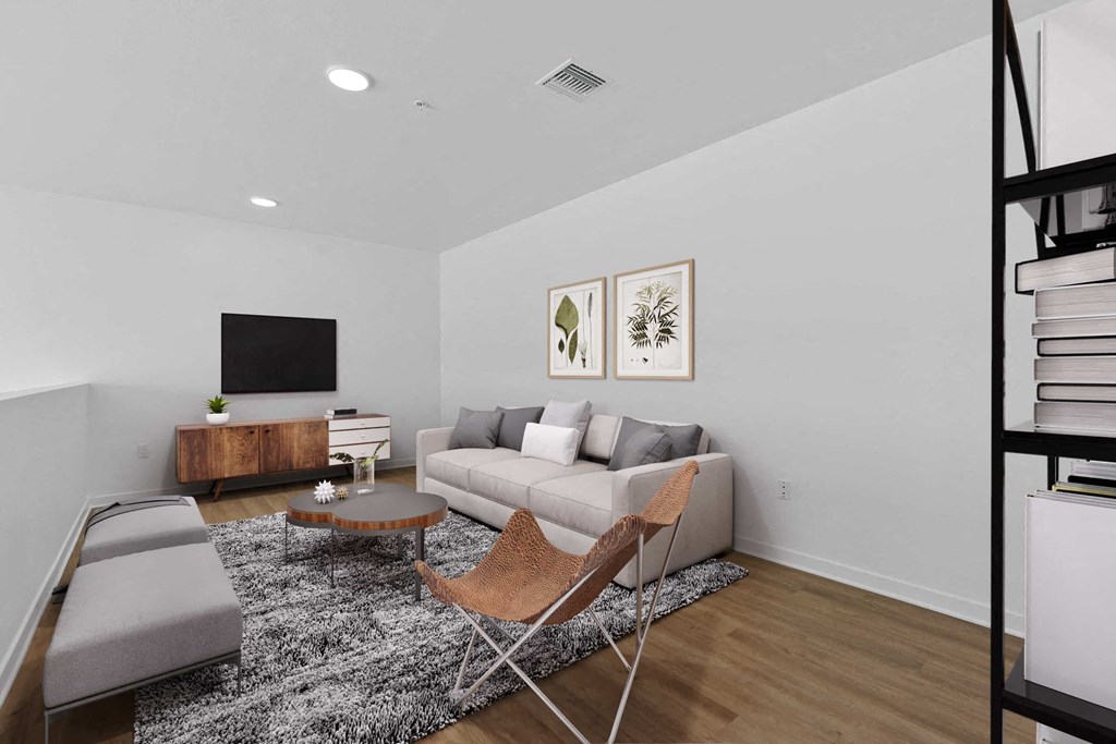 a living room with a couch and a tv