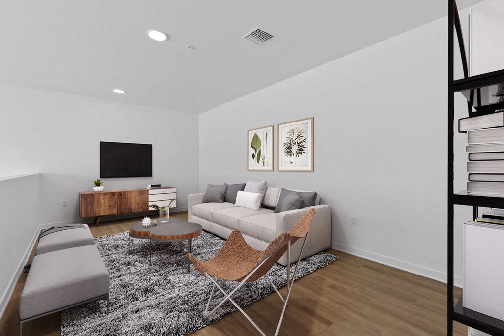 a living room with a couch and a tv