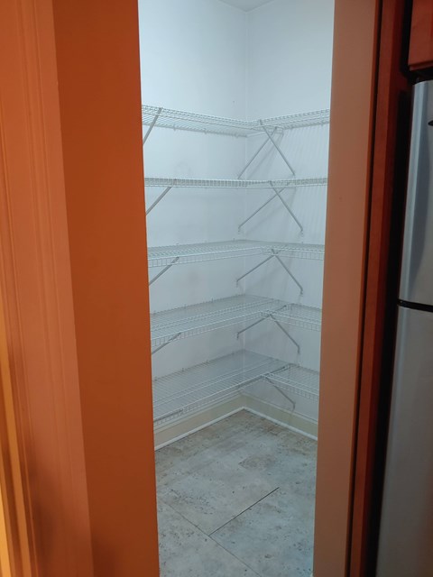 Empty refrigerator with no food inside.