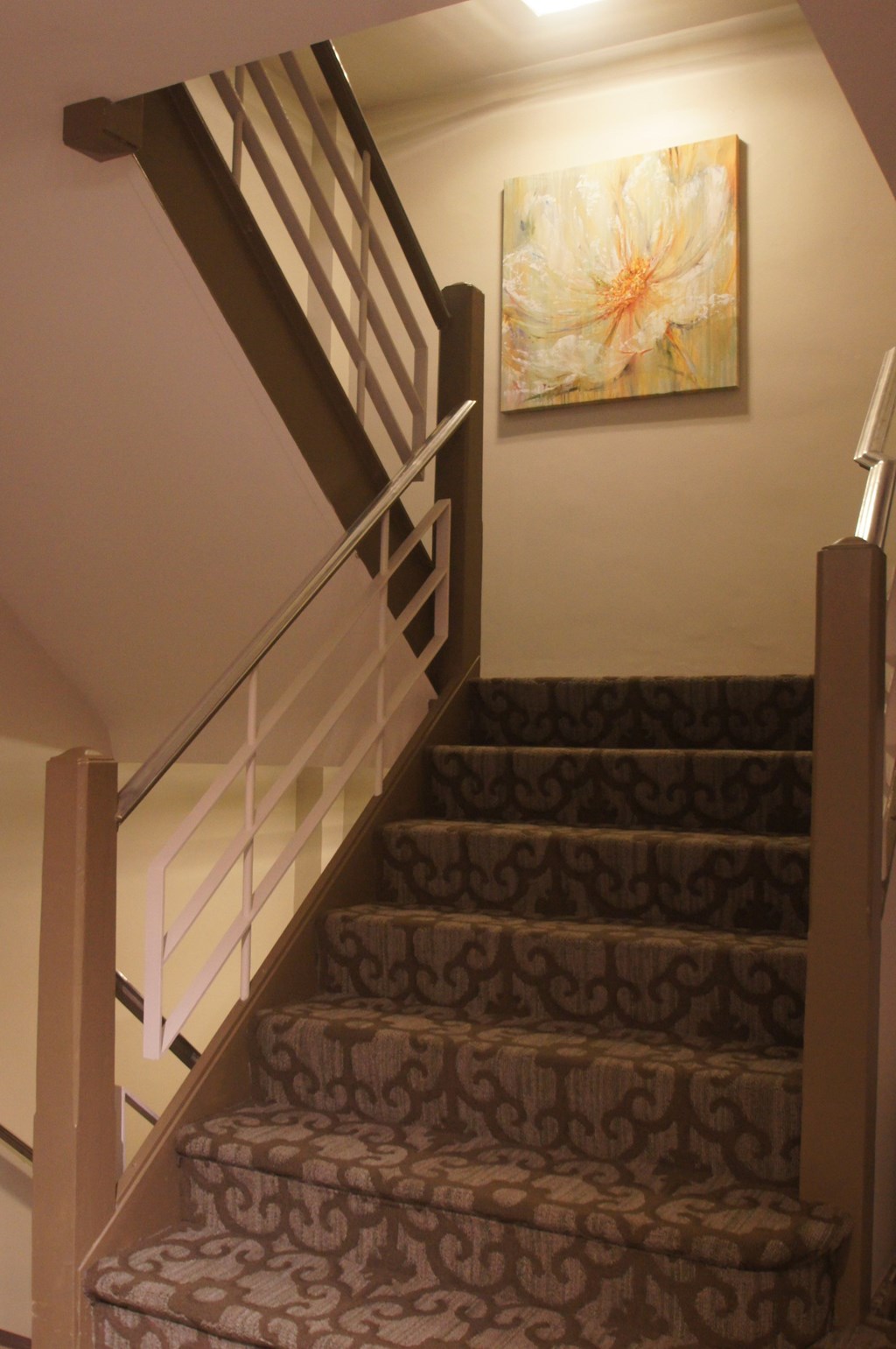 up the stairs to the second floor