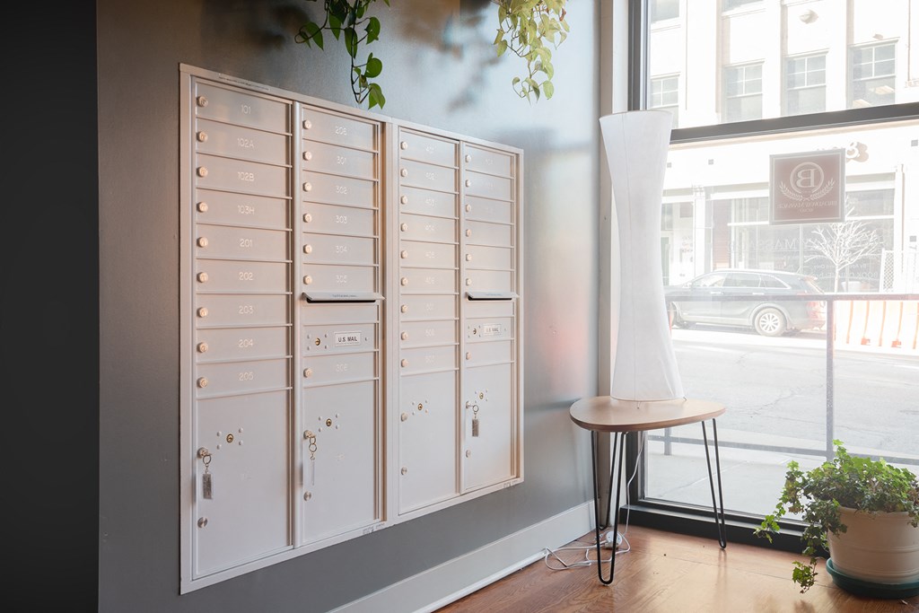 a locker room with a table and a window