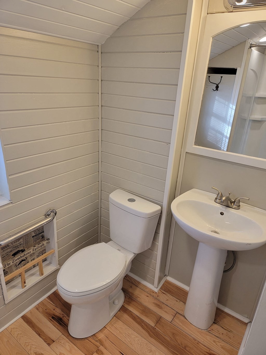 a small bathroom with a toilet and a sink