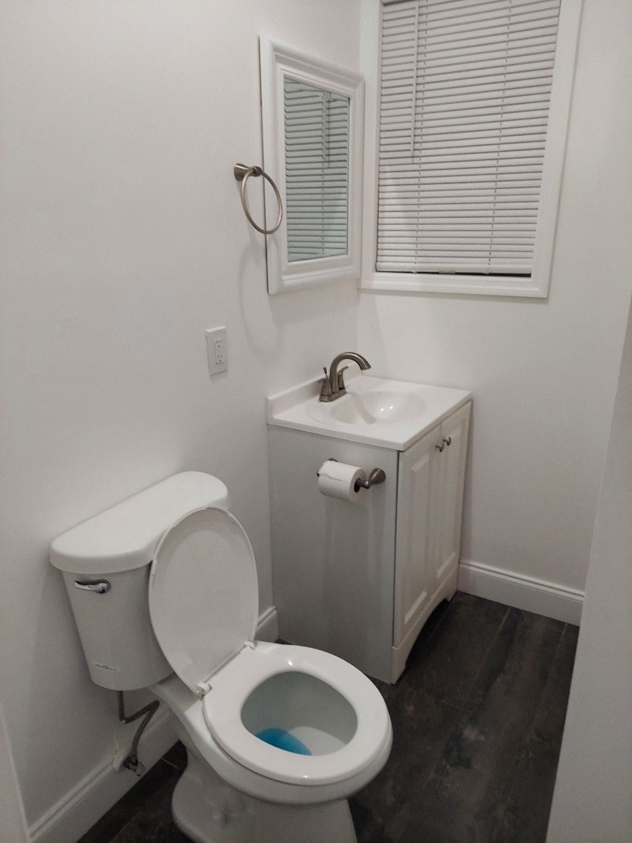 a small bathroom with a toilet and a sink