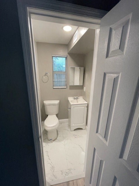 a small bathroom with a toilet and a sink