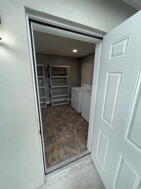 a room with a closet and a laundry room