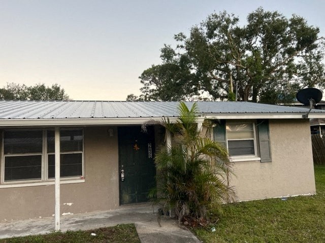 a house with a palm tree in front of it