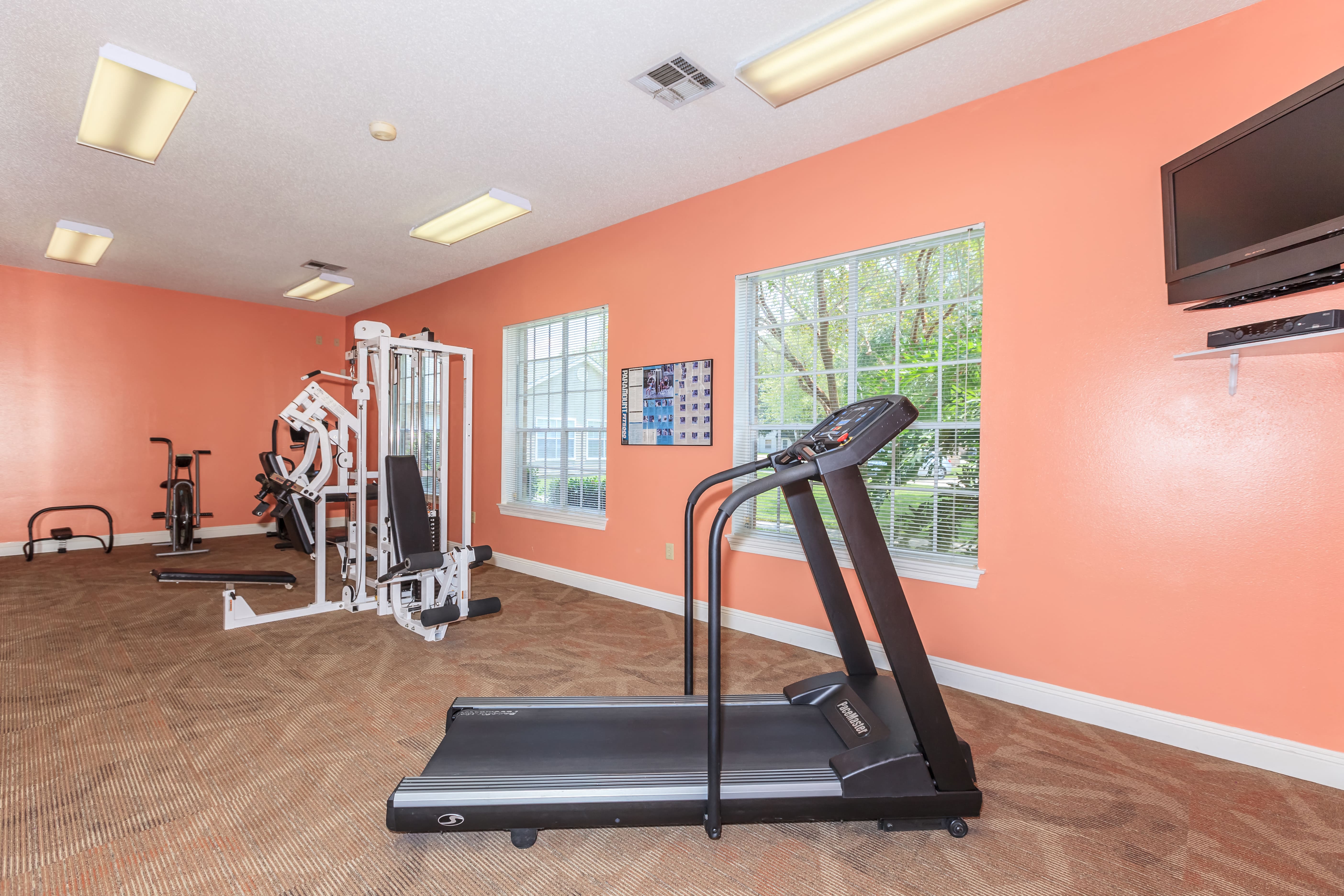 the gym at the at the boulevard apartments in