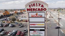 the sign for the fiesta mercado in a parking lot