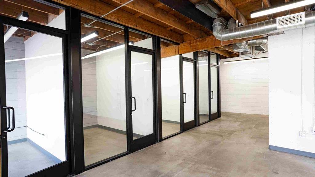 a large room with glass doors in it