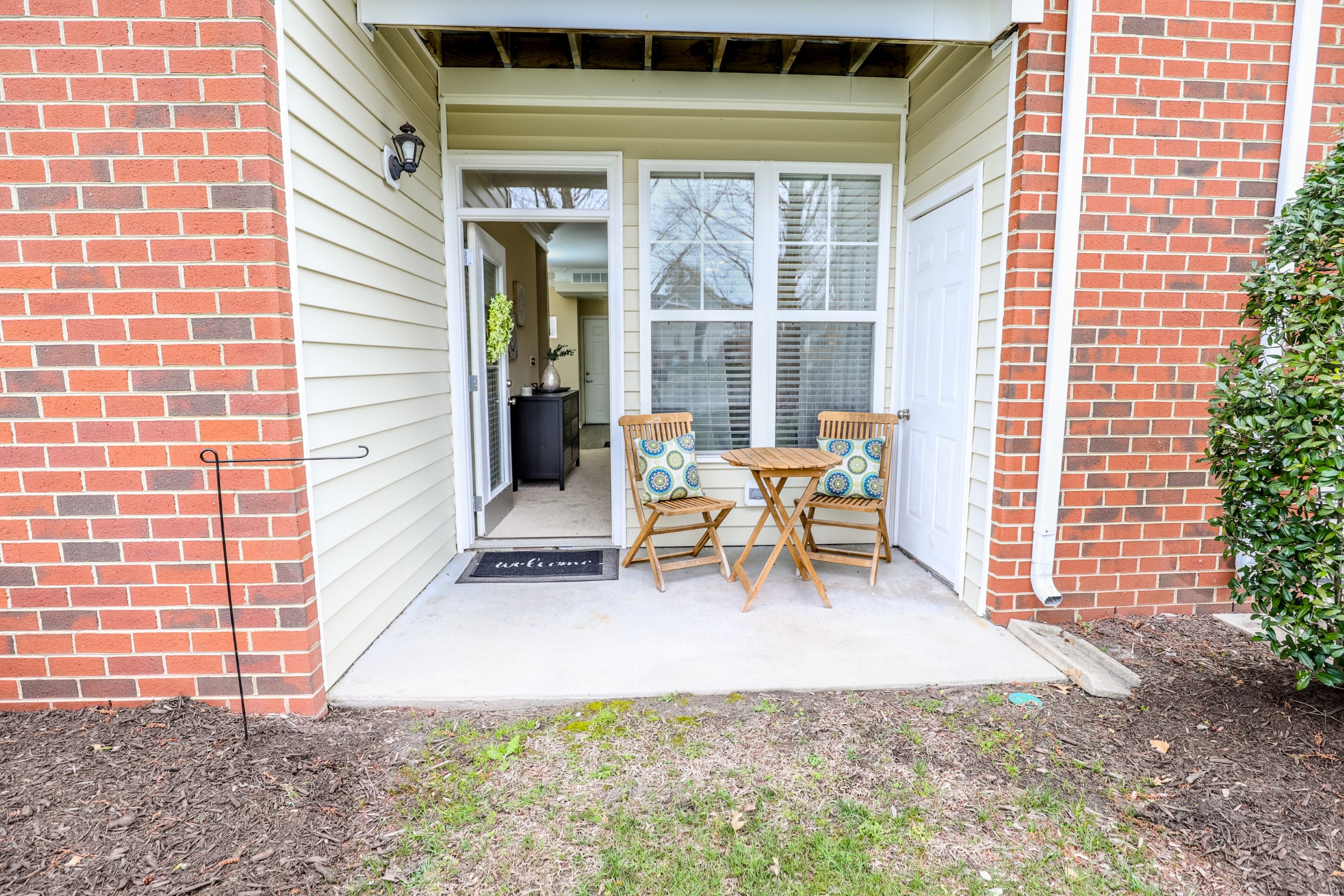 View of the back porch model home at Harbour Breeze Apartments in Suffolk Virginia