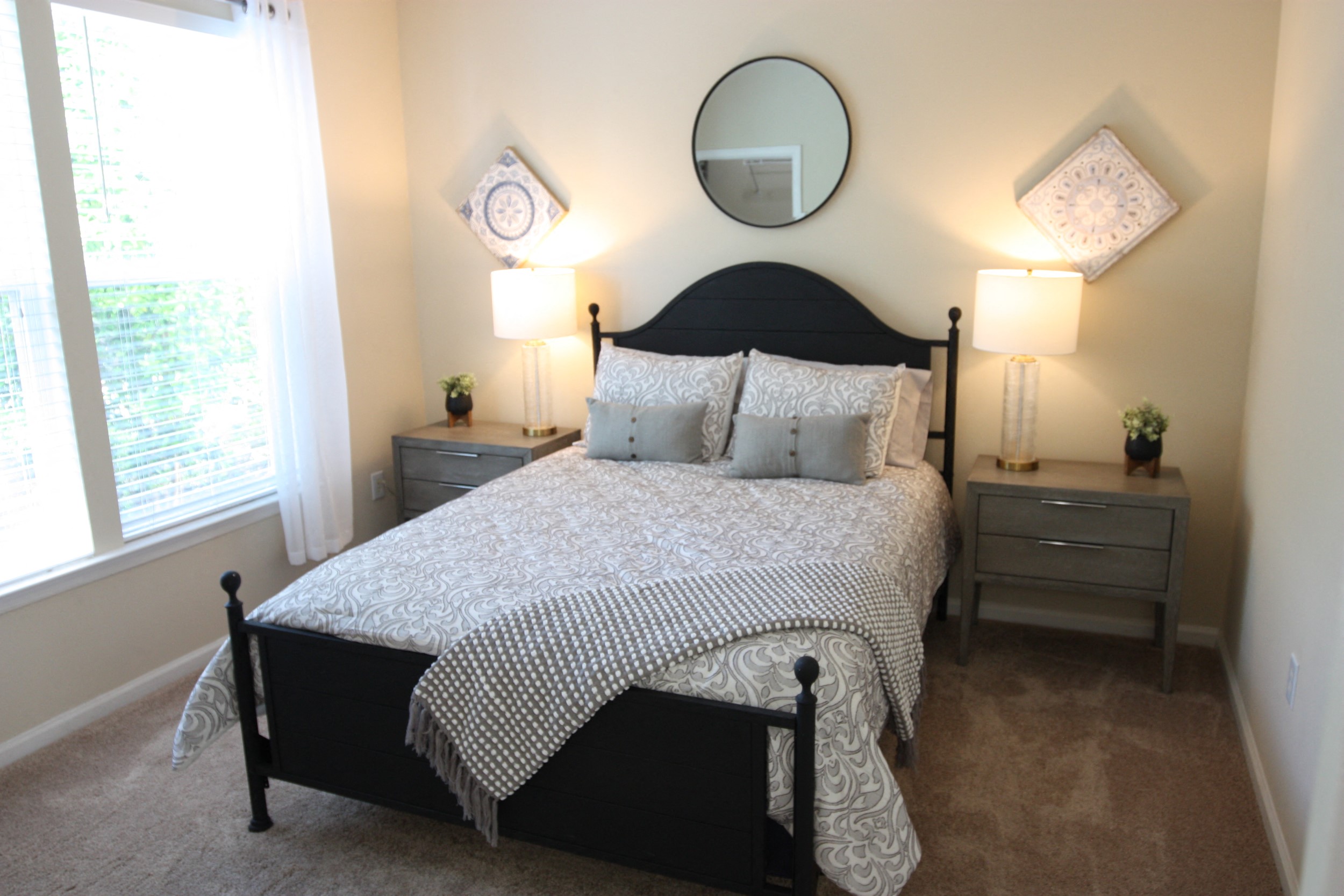 View of the bedroom in the model home at Harbour Breeze Apartments in Suffolk Virginia